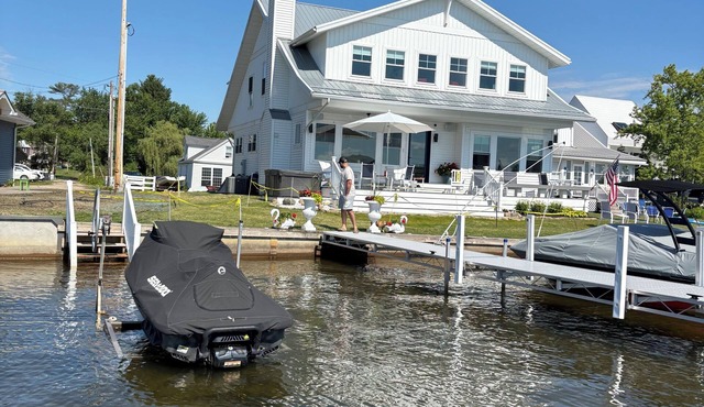 Lake Front Family Cottage with private dock & convenient swim area.