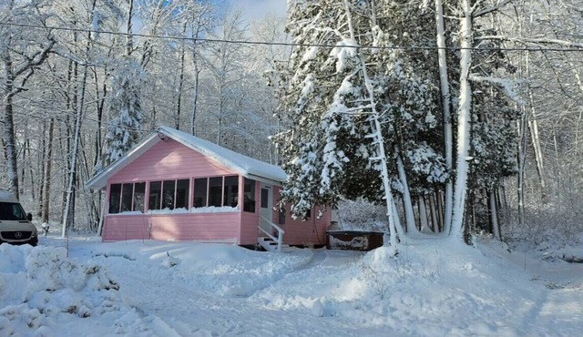 Lakefront vintage pink house