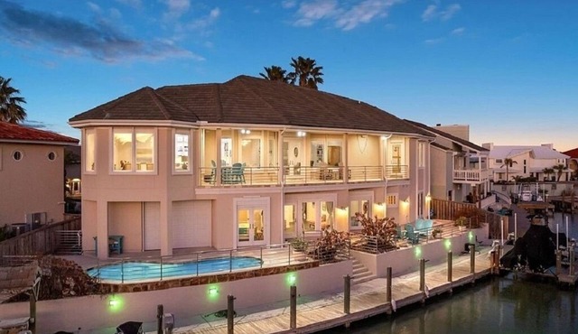 Luxury 6-bedroom waterfront with pool, & jet ski lift on serene Island