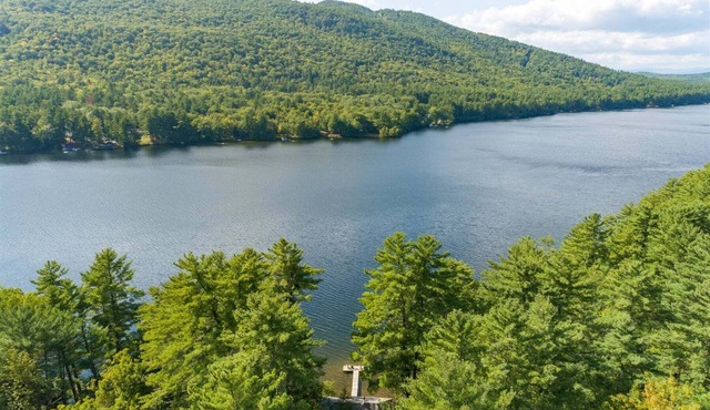 Moose Pond Retreat: Serene Lakeside Sanctuary with Private Dock