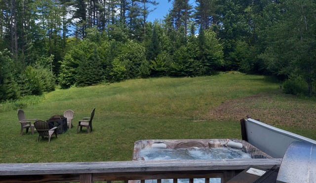 NEW for 2024, 6 person hot tub. Spacious country home with large back yard.