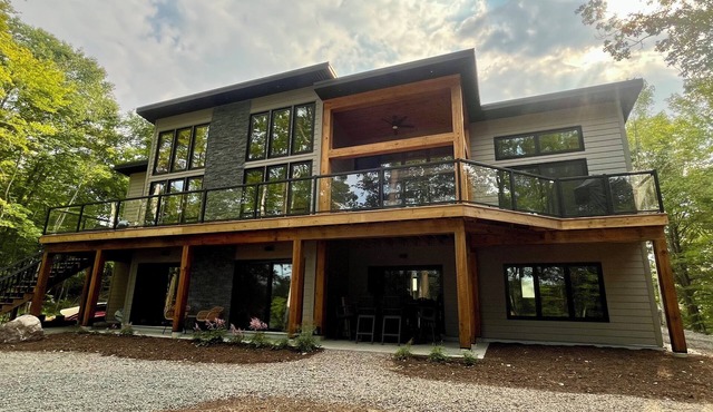 Newly constructed, beautiful, modern lakehouse with new barrel sauna
