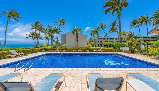 Ocean-view condo with private balcony, washer/dryer, & shared pool/tennis courts