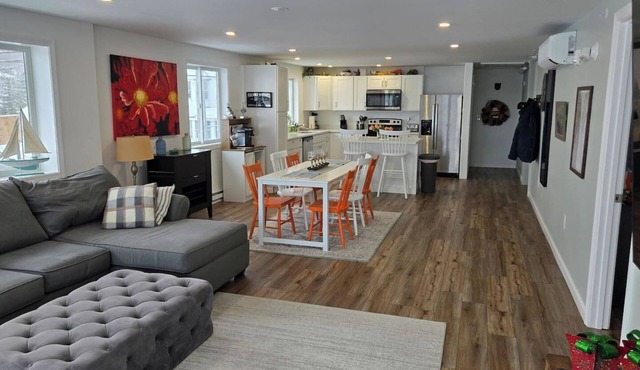 Panoramic rooftop view and pinball game room.