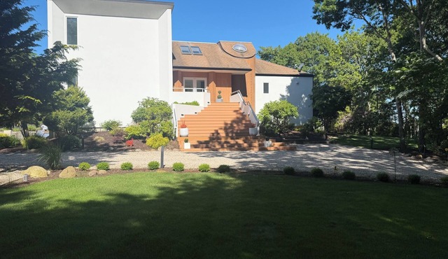 Private 2.1 acre gated home with heated pool and tennis & pickleball court