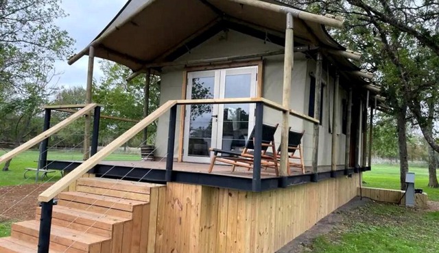 Romantic Lakefront Cabin with Fire Pit near Lake Bastrop, Texas – Luxury Glamping Escape for Couples