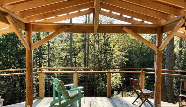 Spacious Cedar Cottage on Tranquil Retreat Centre. 38-Acres of Lush Rainforest