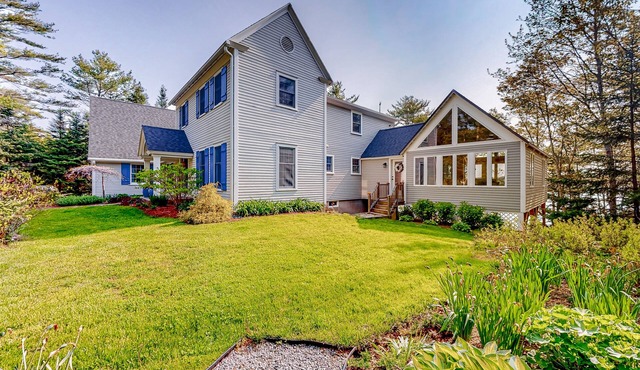 Stunning riverfront gem with private dock, gourmet kitchen, and firepit