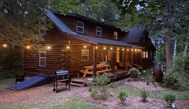 The perfect ADK log cabin getaway on 4 acres and 5 min. to town!
