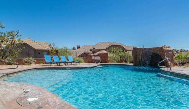 Two heated pools/spas, pond, backyard w/BBQ