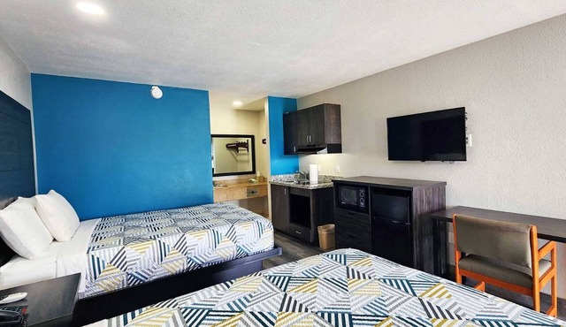 Two Queen Beds Kitchenette Non-Smoking Room at Scottish Inns and Suites!