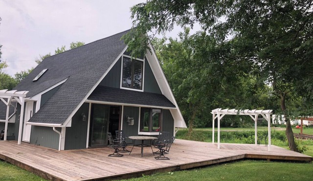 Unwind at this charming A-frame cabin on the lake, ideal for families and pets!