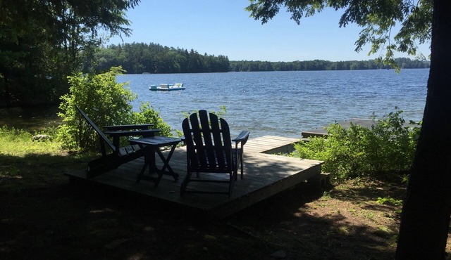 Walk out beach in private cove on Cobboossee Lake