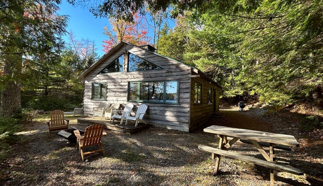Welcoming 4-bedroom lake front cabin in charming Otis on Beech Hill Pond.