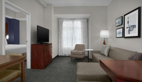 One-Bedroom King Suite with Sofa Bed and Roll-in Shower - Mobility and Hearing Accessible