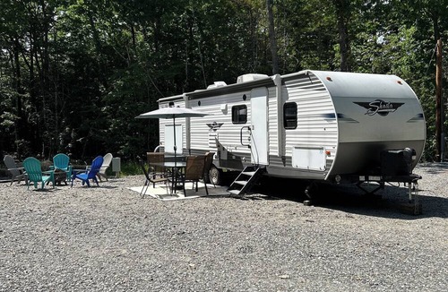 Gardiner House | small campground in the woods with a very unique bath house